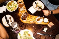 Parent company of casual dining chain closes 21 restaurants in cost