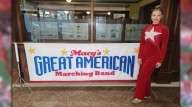 Harmony Grove color guard member marches in the Macy's Great American Marching Band