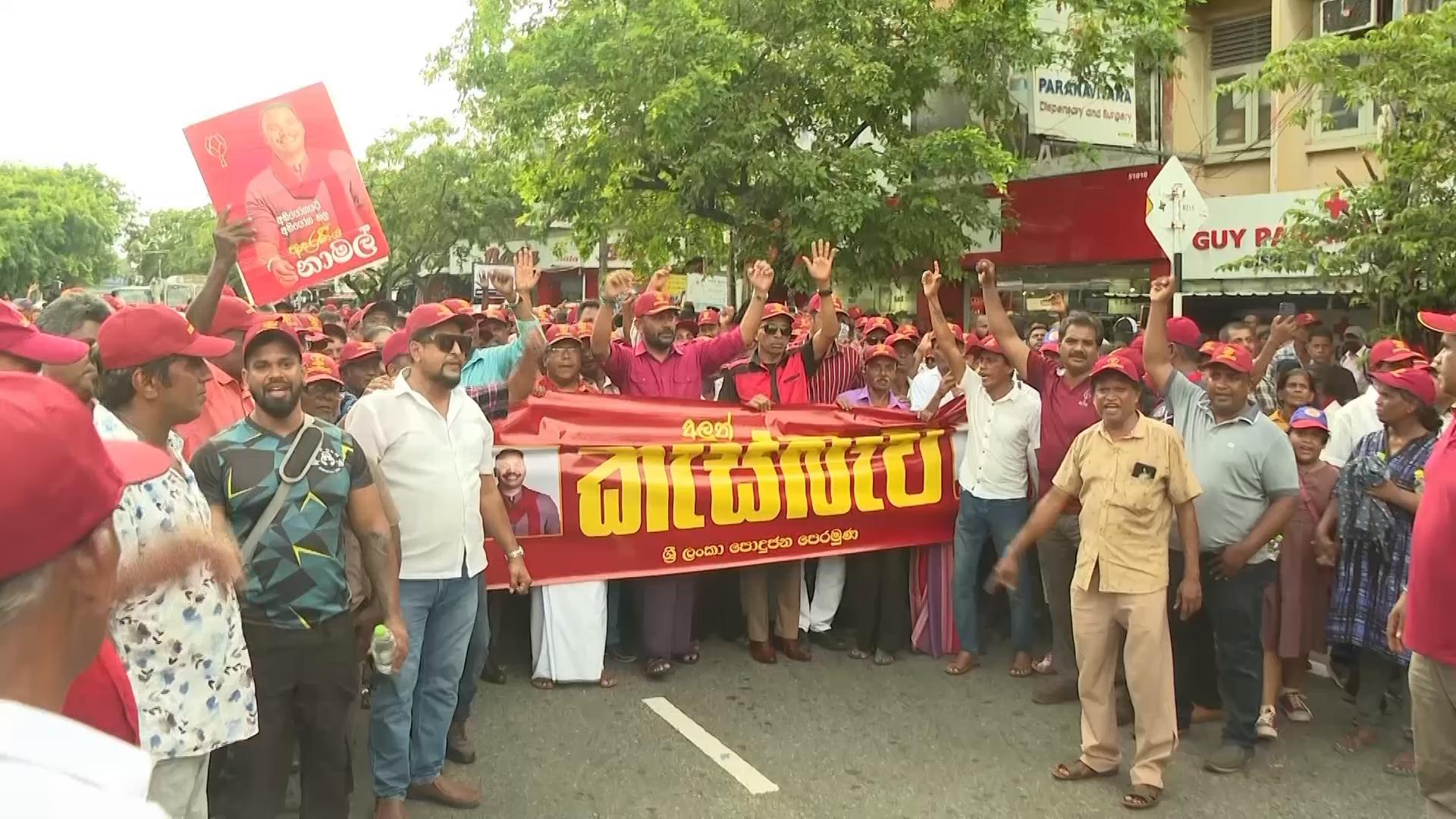 Thousands of supporters of Sri Lanka's opposition demand restoration of law and order