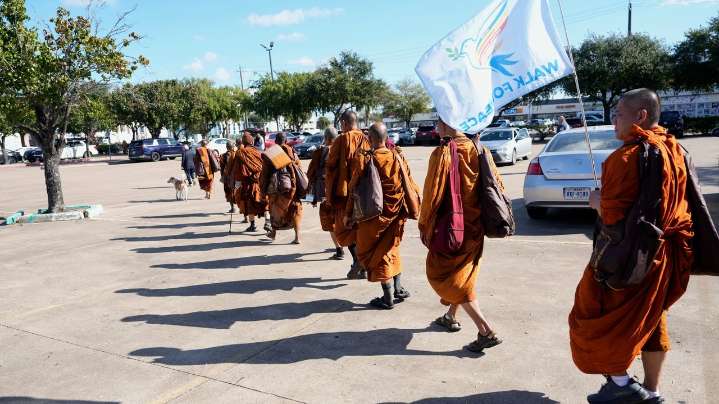 Buddhist monks resume 2,300-mile walk for peace after accident near Houston