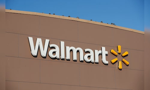 Walmart boosts outlook while warning that higher costs loom