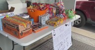 Denver couple hands out food, clothing to trick-or-treaters amidst looming cuts to food assistance