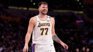 Lakers beat Heat behind Doncic’s triple