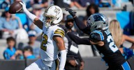 Rookie Shough throws 2 TDs as Saints defeat Panthers