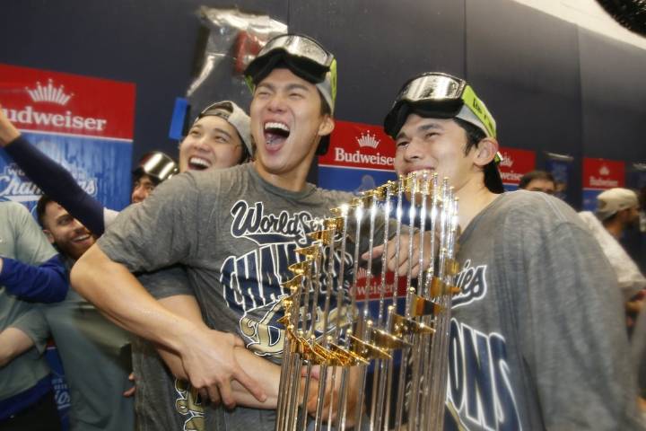 Deadspin | As champagne flows, Dodgers anointed 2026 World Series favorites