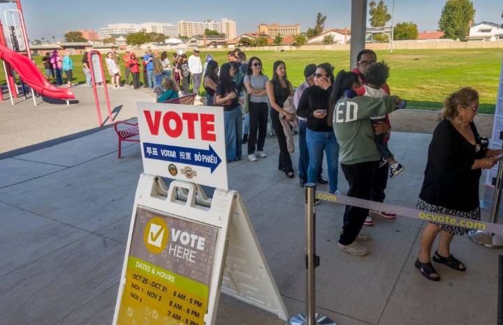 Passions on both sides of Prop. 50 draw long lines, packed voting centers across OC