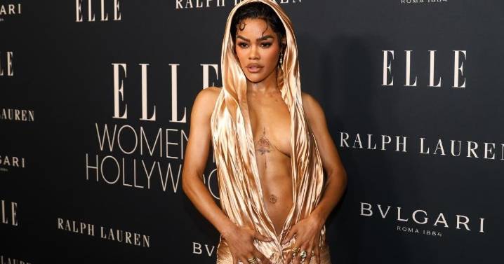 Teyana Taylor's Abs Overshadow Bold Hooded Balmain Gown