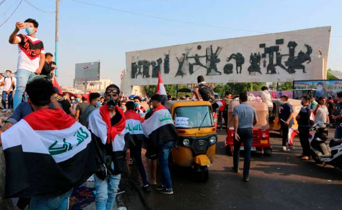 As protests rattle Iraq, influential Shiite cleric calls to overhaul political system