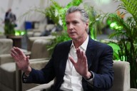 AP Interview: Newsom says Trump climate-fighting absence is 'doubling down on stupid'