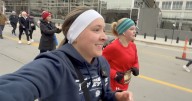 Running reporter documents Turkey Trot from participant's perspective in downtown Omaha