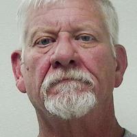 Man accused of pointing gun at door-to-door salesman to plead guilty