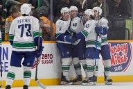 Boeser scores late OT winner as Canucks beat pesky Predators 5