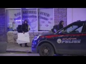 Police: 1 dead, 1 hurt after shooting at apartment on Auburn Ave.