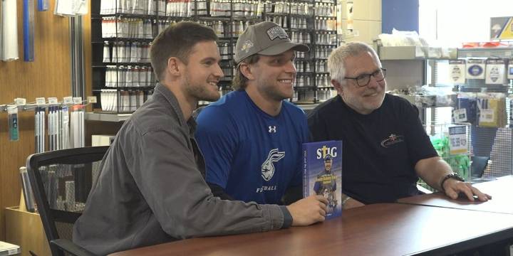Book signing at South Dakota State brings back football legends for a good cause