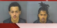Shooting into home leads to two arrests and guns seized