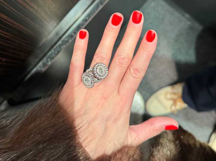 This bride-to-be doesn't wear a lot of jewelry. Her mom and fiancé picked a massive, cocktail engagement ring for her anyway.