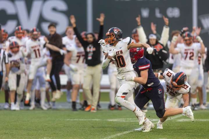 Nico Atwood’s interception seals Newton North comeback win over Brookline at Fenway Park