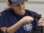 Families build traditions of giving back by building bikes