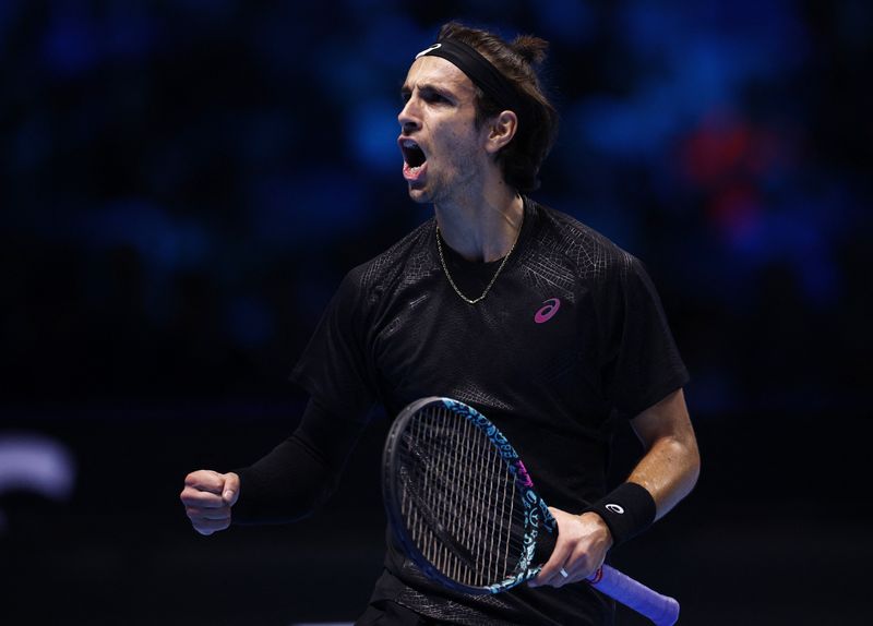 Tennis-Musetti battles 'until the end' to remain at ATP Finals