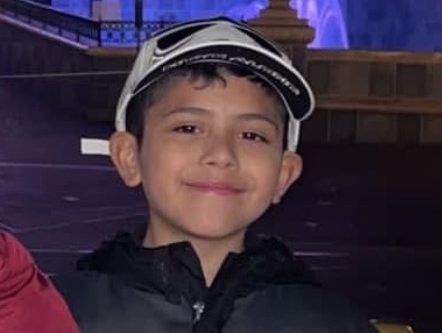 Video shows stepdad sobbing after boy shot in road