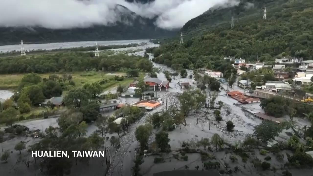 Rain still falls as Taiwan begins cleanup from tropical storm which brought flooding and landslides