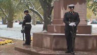 Torontonians gather in the snow to mark Remembrance Day