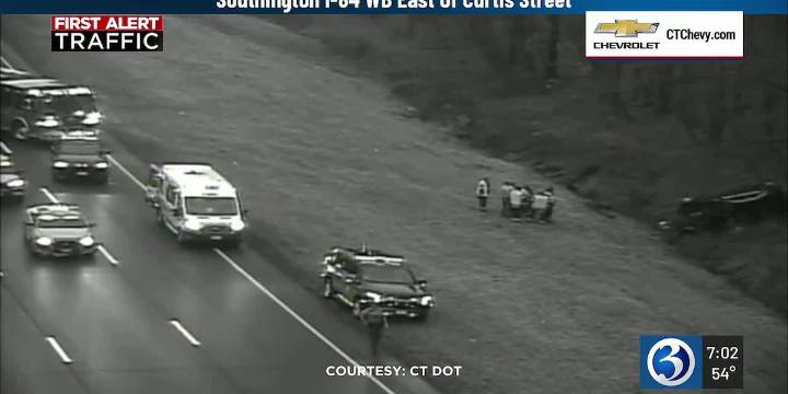 Overturned vehicle shuts down lanes on I