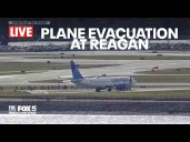 Emergency response at Reagan National Airport after security incident on arriving flight