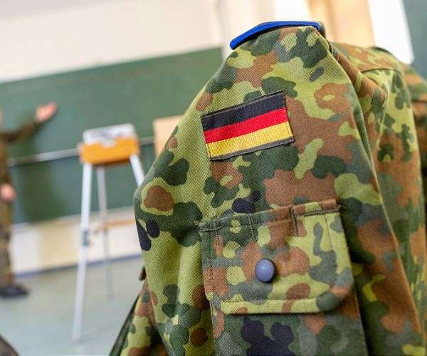 Germany agrees to keep military service voluntary