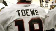 Why is Loewen pronounced "Low-en" and Toews pronounced "Taves"?