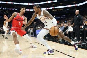 Green shines as Suns thump Clippers 115