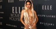 Teyana Taylor's Abs Overshadow Bold Hooded Balmain Gown