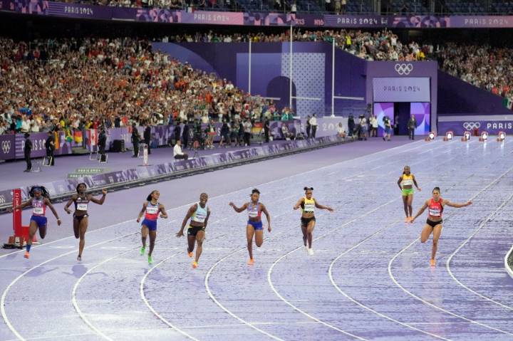 Track to open LA Olympics, with women's 100-meter sprinters lining up three times in the same day