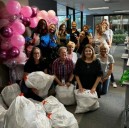 Phoenix law firm gathers to pack menstrual products for those in need
