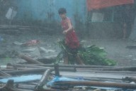 Typhoon Fung-wong blows away from the Philippines, leaving 8 dead and 1.4 million displaced
