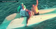 U.S. Coast Guard finds 4 missing boaters alive after their boat capsized