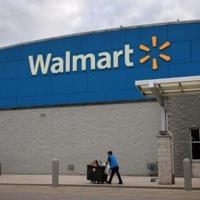 Walmart lifts outlook in quarterly results with e