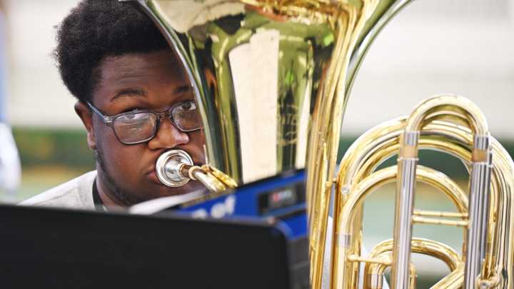 Detroit native strikes up the band again at Cody High School after 20 years