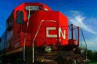 Train and tractor collision leaves tractor destroyed, driver injured