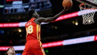 Banged-up Hawks roll to a 122-102 victory over the Lakers as Gueye scores a career