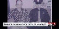 Family of fallen Omaha officer receives honor flag