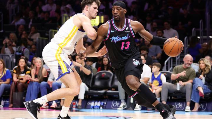 Heat surge late to defeat short-handed Warriors 110