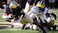 Ashford throws for three TDs as Wake Forest whips Delaware 52