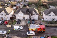Man held for attempted murder after three house fires in 20 minutes