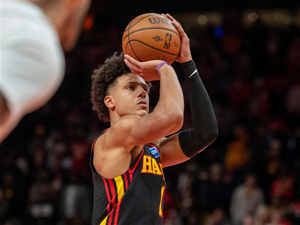 Johnson's triple-double leads Hawks to 130-123 victory over Cavs in NBA Cup game