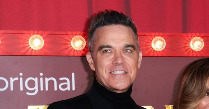 Robbie Williams makes rare red carpet appearance with daughter Teddy