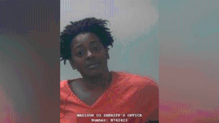 Woman arrested, charged with murder in August shooting