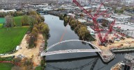Bridge over River Trent lifted into place by Europe's biggest crane