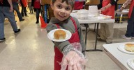 'He's having a blast': Volunteers of all ages help serve Helena Salvation Army Thanksgiving dinner
