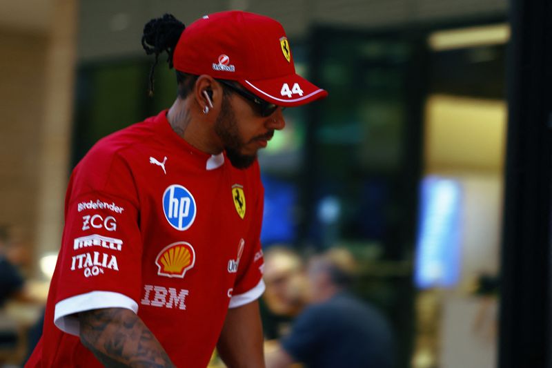 Motor racing-No regrets about moving to Ferrari, says Hamilton